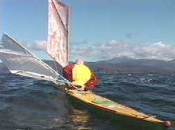 Laurie putting up sails