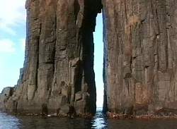 A tall sea cave.